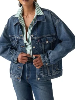Veste en coton indigo à coupe ajustée pourvue d'un col à revers
