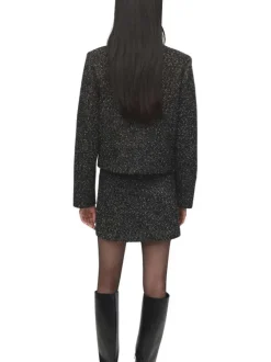 Veste noire en maille jaspée avec une coupe droite et un col rond